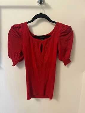 bebe Red Puff-Sleeve Knit Top with Keyhole